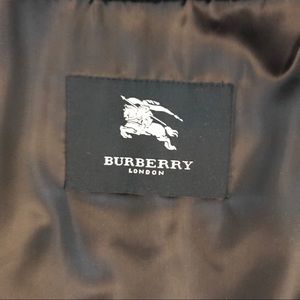 Authentic Black burberry coat. Get to me, $300.